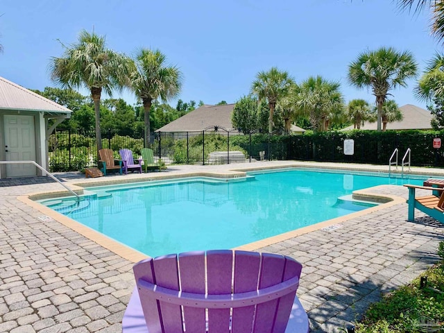 4979 Leeward Dr, Pensacola, FL 32507 - pool with a patio area and fence