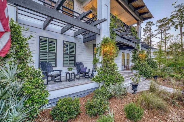 4979 Leeward Dr, Pensacola, FL 32507 - wooden deck with a pergola and a porch