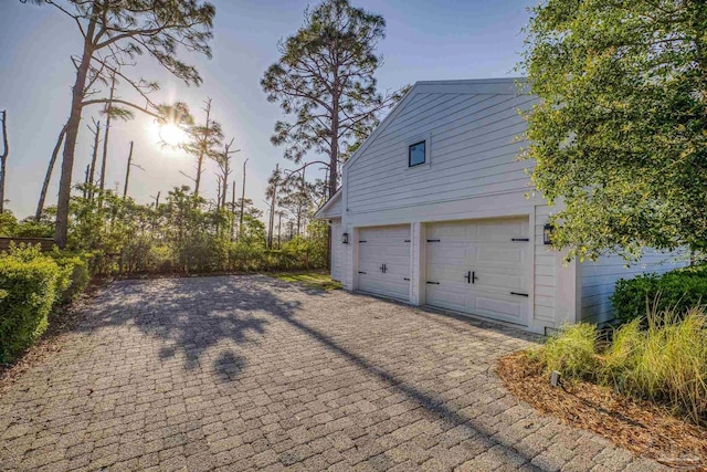4979 Leeward Dr, Pensacola, FL 32507 - garage with decorative driveway
