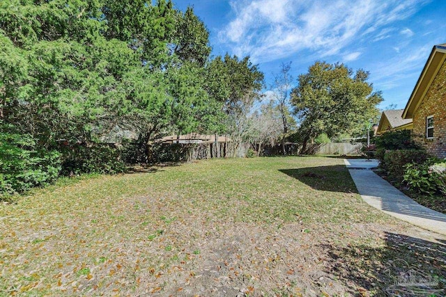 view of yard with fence