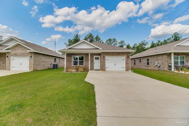 view of front of house with brick siding, driveway, an attached garage, and a front yard
