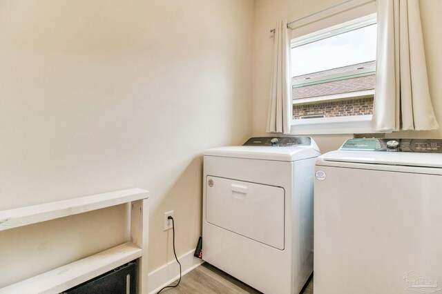 laundry room with washer and dryer