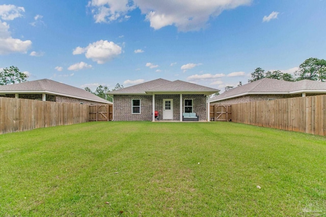 back of property with brick siding