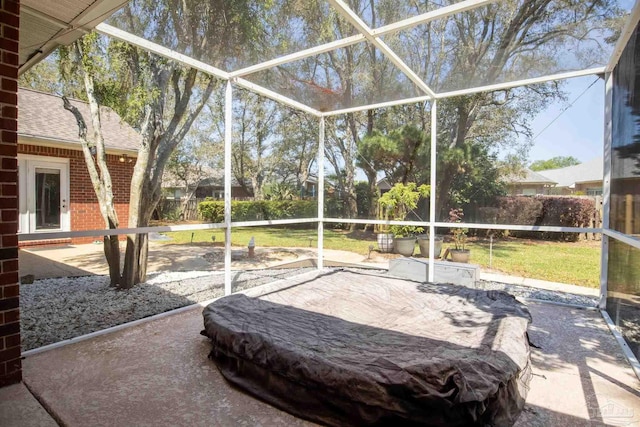 1126 Mary Kate Dr, Gulf Breeze, FL 32563 - view of patio with glass enclosure and a fenced backyard