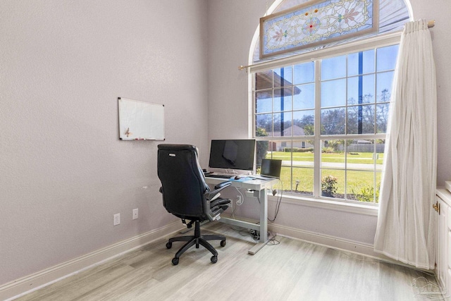 1126 Mary Kate Dr, Gulf Breeze, FL 32563 - office area with baseboards and wood finished floors