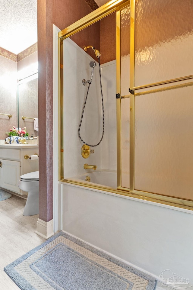 1126 Mary Kate Dr, Gulf Breeze, FL 32563 - full bathroom with wood finished floors, vanity, bath / shower combo with glass door, and toilet