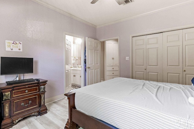 1126 Mary Kate Dr, Gulf Breeze, FL 32563 - bedroom with light wood-type flooring, baseboards, a closet, connected bathroom, and ornamental molding
