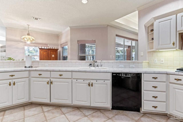 1126 Mary Kate Dr, Gulf Breeze, FL 32563 - kitchen with crown molding, a sink, backsplash, black dishwasher, and visible vents