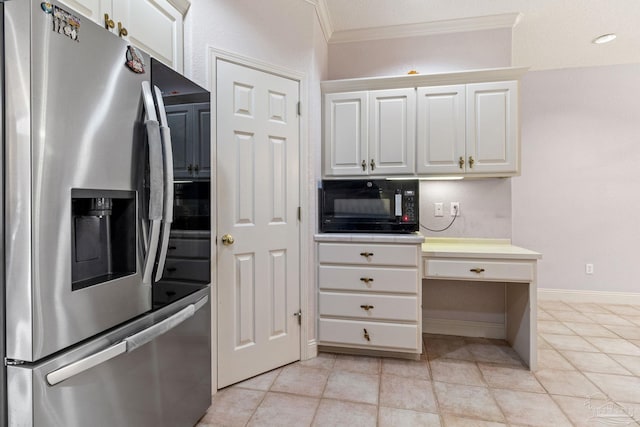 1126 Mary Kate Dr, Gulf Breeze, FL 32563 - kitchen featuring stainless steel fridge with ice dispenser, light countertops, black microwave, crown molding, and white cabinetry