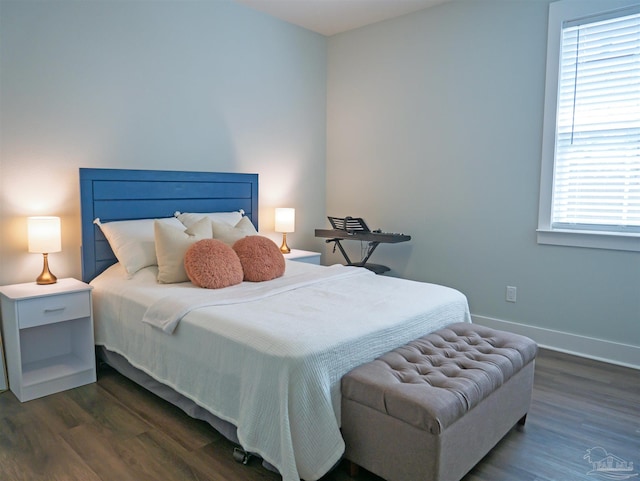 817 N D St, Pensacola, FL 32501 - bedroom with dark wood-type flooring and baseboards