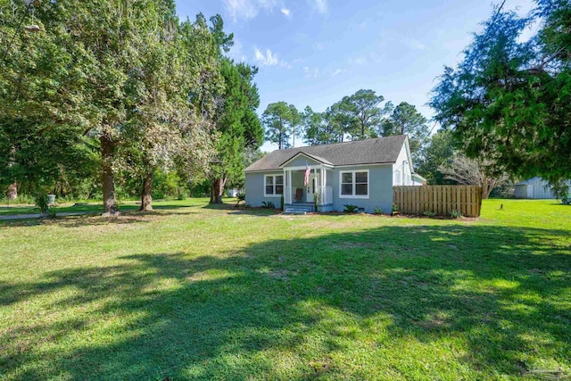 ranch-style home with a front yard