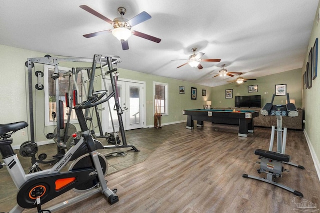 exercise room with lofted ceiling, pool table, ceiling fan, and hardwood / wood-style flooring