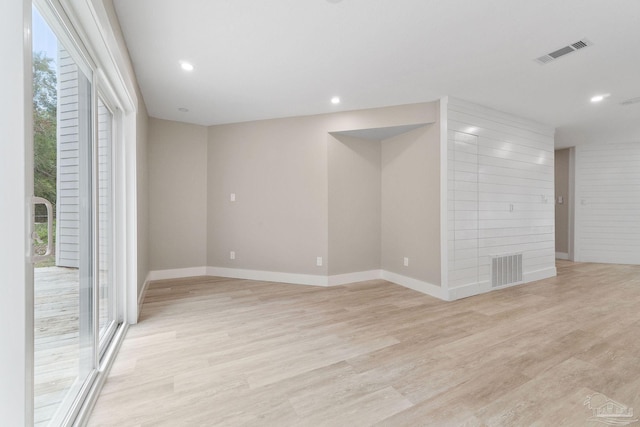 spare room with light wood-type flooring