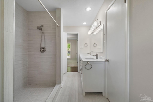 770 Connell Dr, Pensacola, FL 32503 - full bathroom with vanity, a tile shower, and recessed lighting