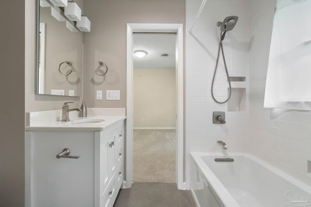 770 Connell Dr, Pensacola, FL 32503 - full bathroom featuring washtub / shower combination, vanity, and tile patterned flooring