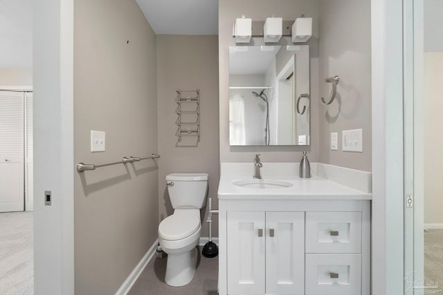 770 Connell Dr, Pensacola, FL 32503 - bathroom featuring baseboards, toilet, and vanity
