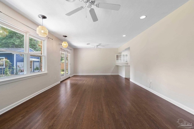 770 Connell Dr, Pensacola, FL 32503 - unfurnished living room featuring a ceiling fan, wood finished floors, baseboards, and recessed lighting
