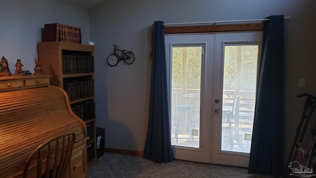 carpeted bedroom featuring french doors