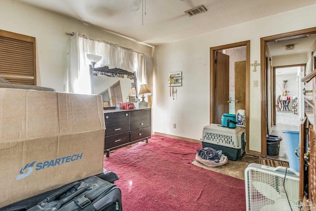 interior space with ceiling fan and carpet