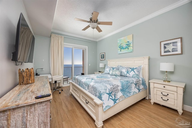 bedroom with access to exterior, light hardwood / wood-style floors, ceiling fan, and crown molding