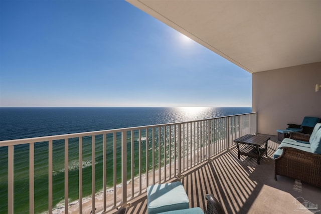 balcony featuring a water view