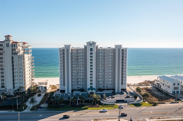 aerial view featuring a water view and a view of the beach