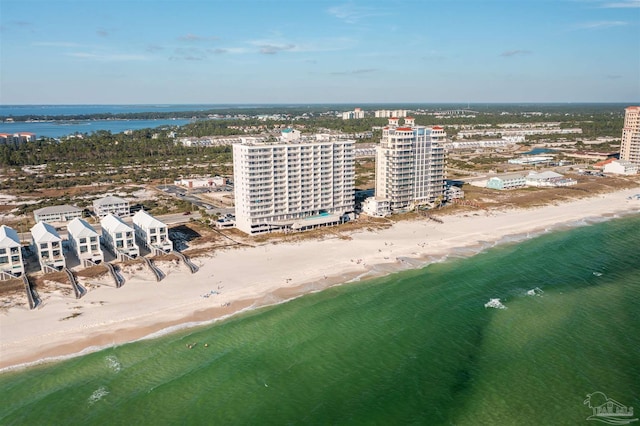 aerial view featuring a view of the beach and a water view