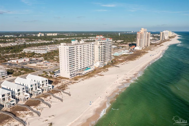 bird's eye view with a view of the beach and a water view