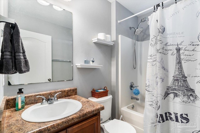 full bathroom with vanity, toilet, and shower / bath combo with shower curtain