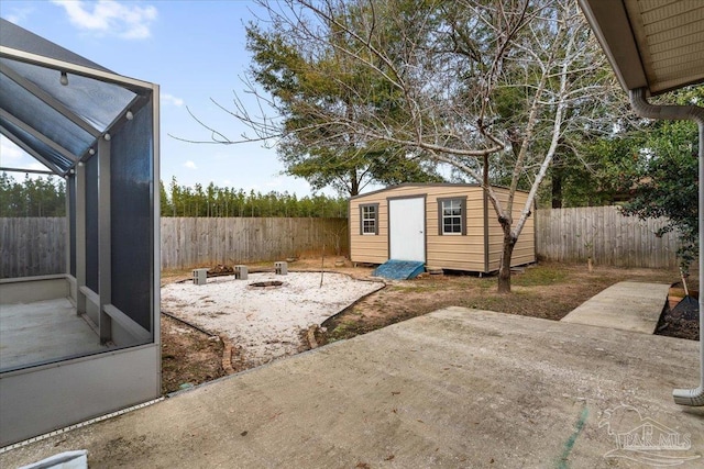 view of patio / terrace with a shed