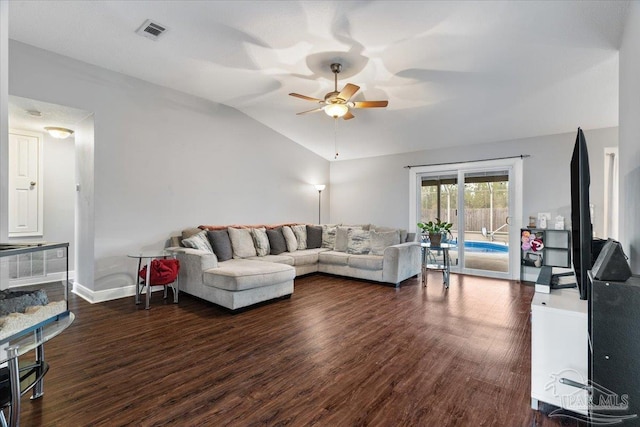 living room featuring lofted ceiling, dark hardwood / wood-style floors, and ceiling fan