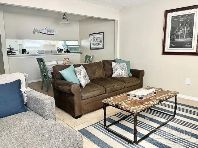 living room featuring light tile patterned flooring