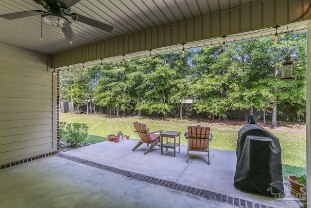 view of patio featuring a grill, a fenced backyard, and ceiling fan