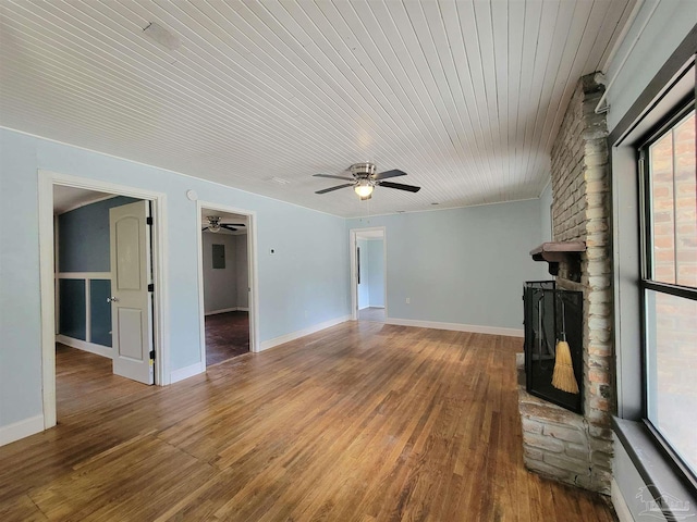 5927 Mitchell Ln, Pensacola, FL 32526 - unfurnished living room with baseboards, a ceiling fan, and wood finished floors