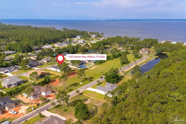1192 Adrian Way, Milton, FL 32583 - aerial view of property and surrounding area featuring a nearby body of water and nearby suburban area