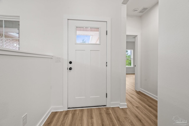 1192 Adrian Way, Milton, FL 32583 - foyer with wood finished floors and baseboards