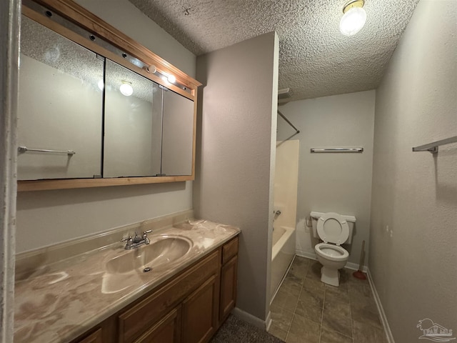 full bathroom with a textured ceiling, vanity, baseboards, toilet, and shower / bathtub combination