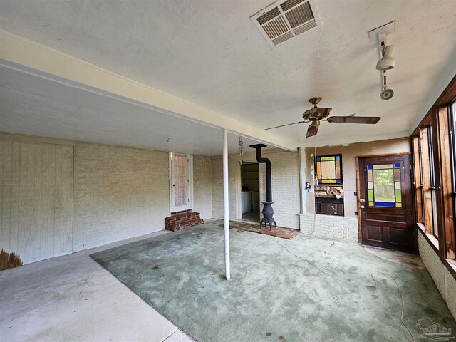 exterior space with ceiling fan and a porch