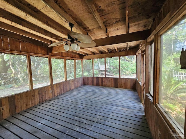 unfurnished sunroom featuring ceiling fan and wooden ceiling