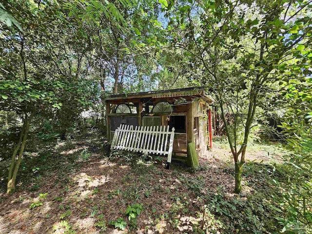 exterior space featuring an outbuilding