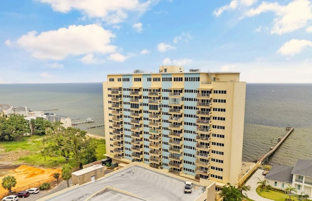 view of building exterior with a water view