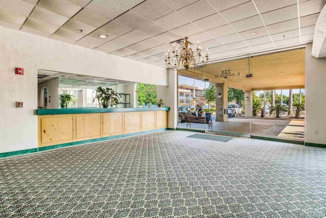 224 E Garden St Unit 236, Pensacola, FL 32502 - welcome area featuring an inviting chandelier