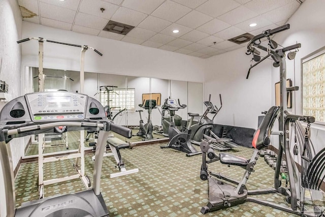 224 E Garden St Unit 236, Pensacola, FL 32502 - exercise room featuring a paneled ceiling and carpet