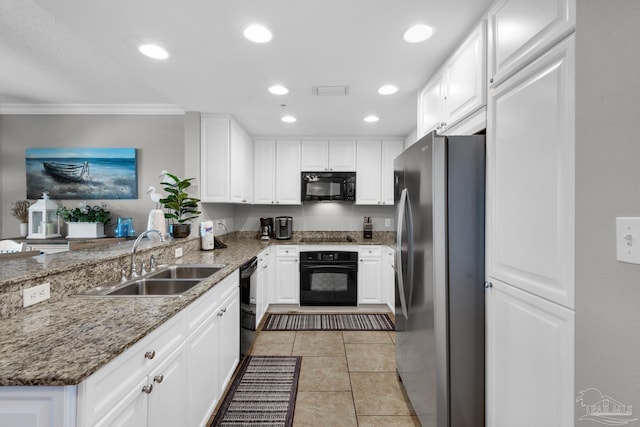 kitchen featuring kitchen peninsula, sink, white cabinets, and black appliances