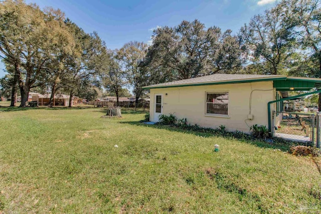 view of yard featuring fence