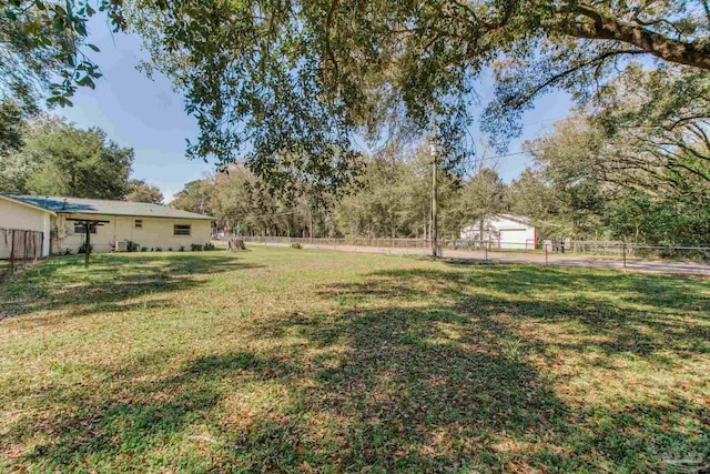 view of yard with fence