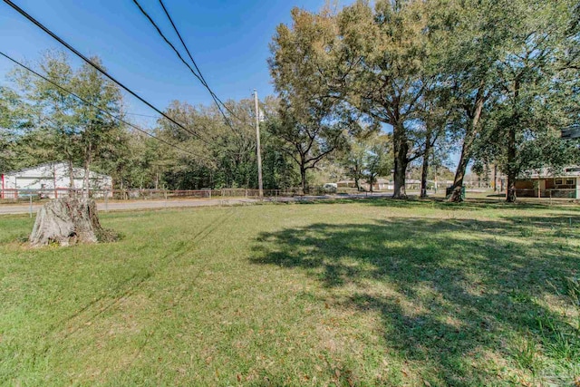 view of yard with fence