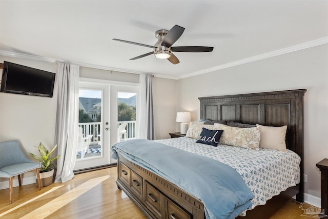 bedroom featuring french doors, light wood-type flooring, ornamental molding, access to outside, and ceiling fan