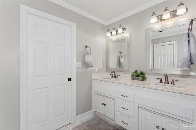 bathroom with tile patterned floors, vanity, and ornamental molding