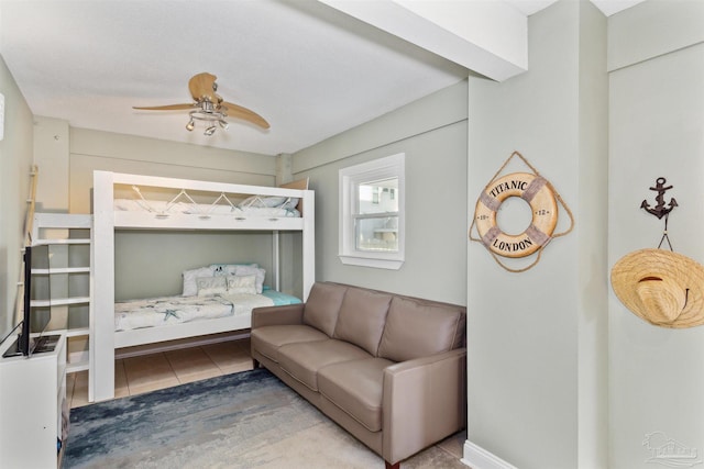 bedroom with tile patterned floors and ceiling fan